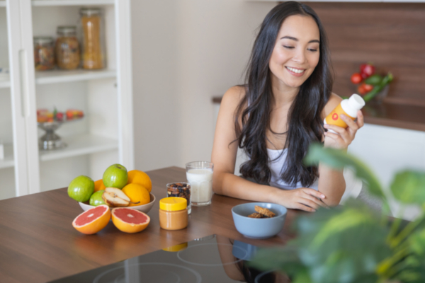 woman taking vitamins
