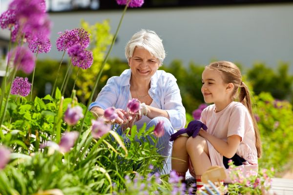 grandmother and girl gardening