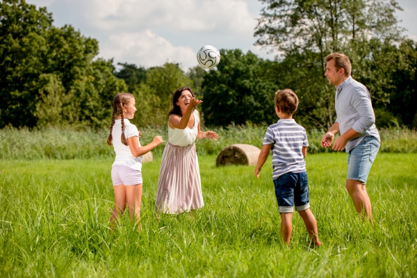 happy family playing in the park
